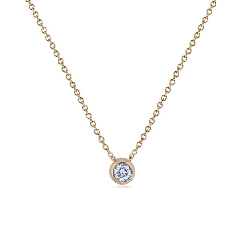 Collier solitaire diamant 0.12ct serti clos or jaune