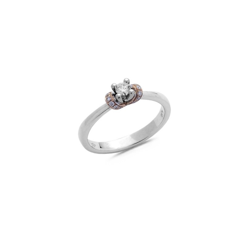 Bague solitaire accompagné  diamants 0.12ct et 0.07c or bicolore doigt 55    (241431)